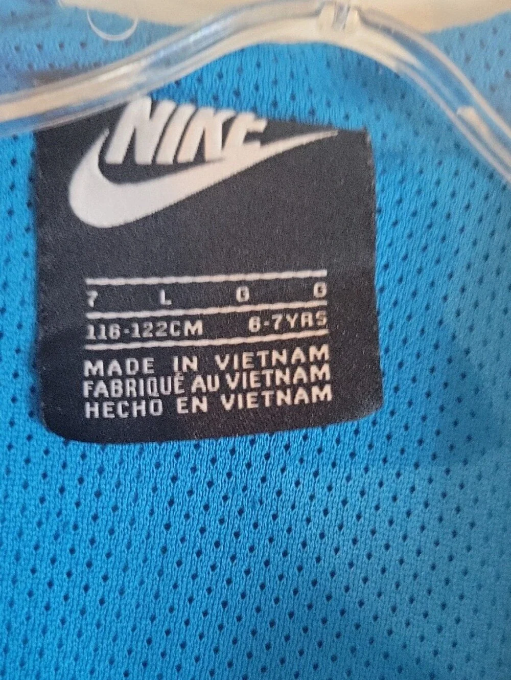 Nike Kids Two-Tone Blue Hooded Rain Jacket with Teal Stripe